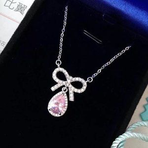 0.75ct. Pear Shape Lab Diamond Bow Necklace in Sterling Silver